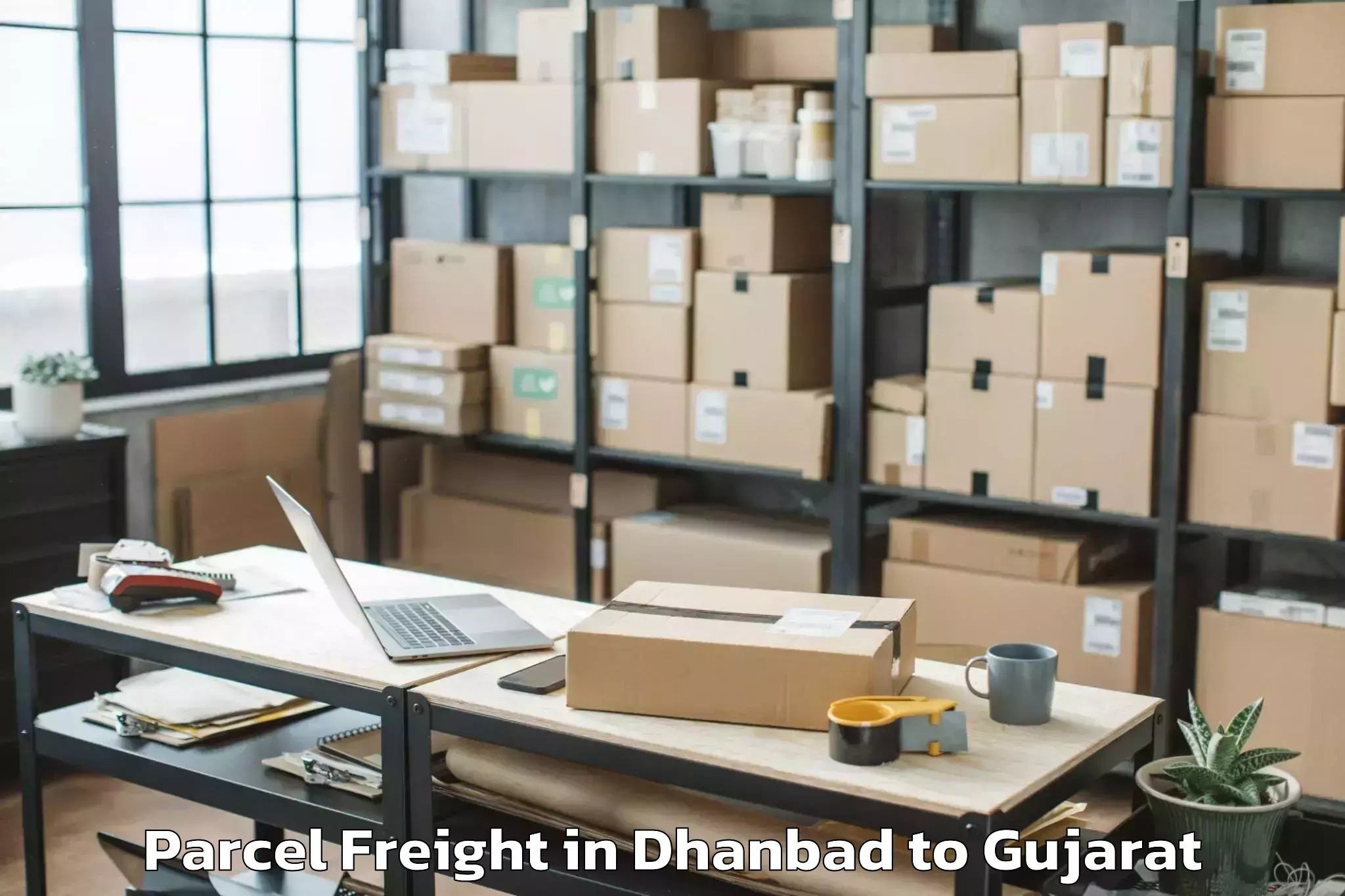 Easy Dhanbad to Una Gir Somnath Parcel Freight Booking